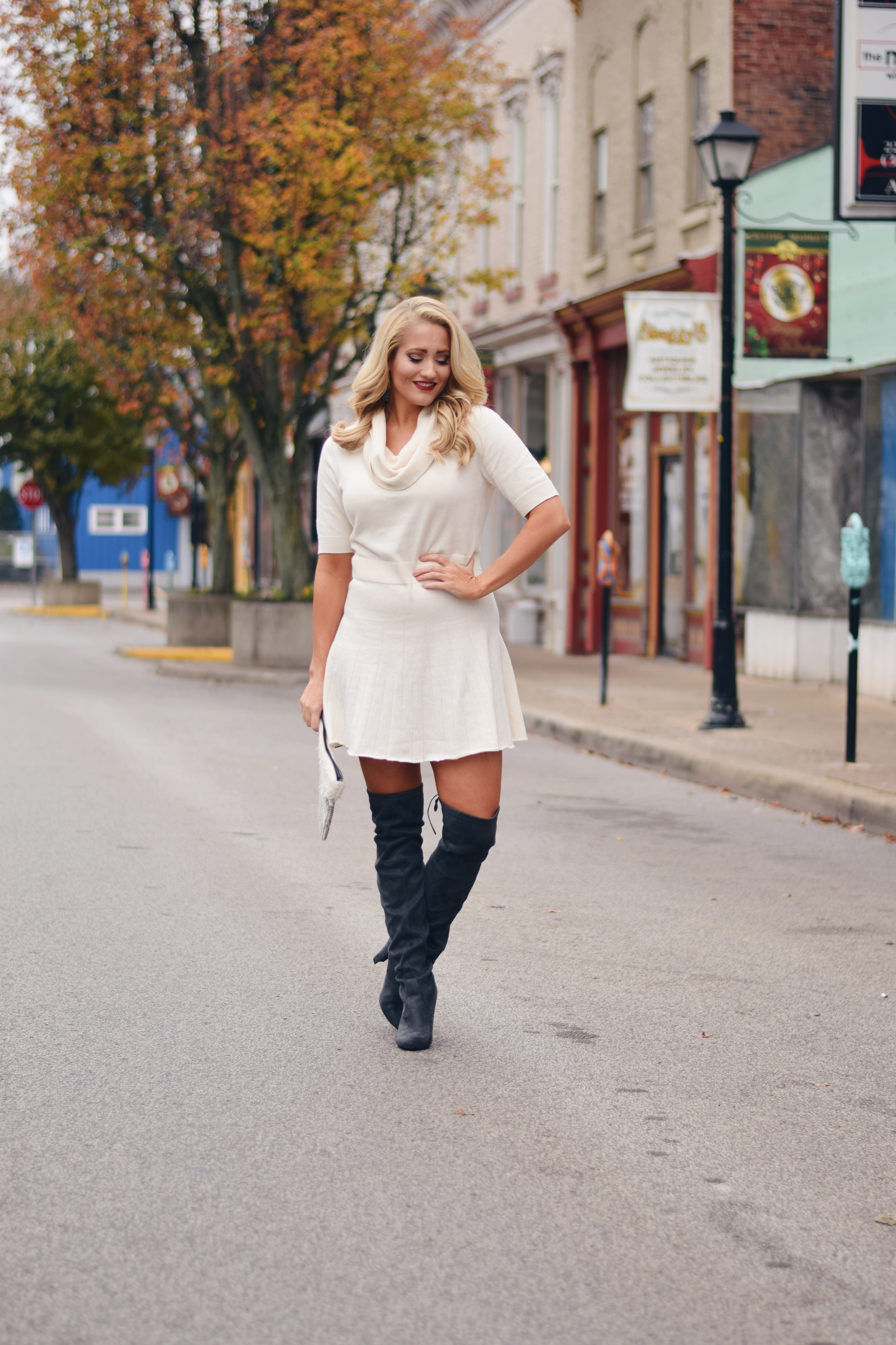 white sweater dress with boots